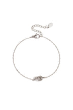 Simple bracelet with knotted charm